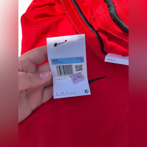 NWT Men’s Nike medium shorts In perfect condition and colors are red and black! - Picture 3 of 3